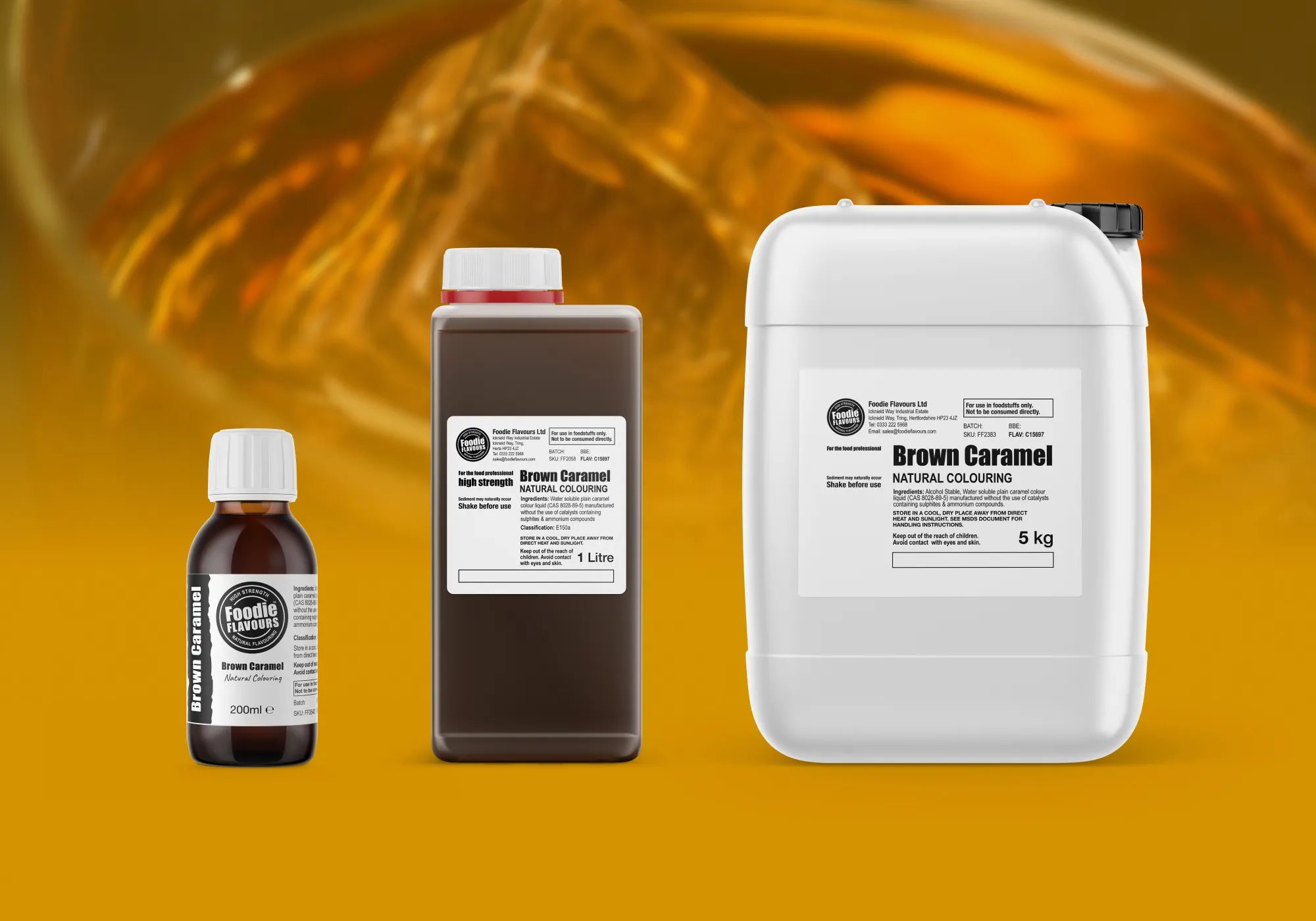 Three containers of brown natural caramel colouring. 200ml, 1L and 5kg. In the background is an image of a glass of whisky with a rich brown colour.