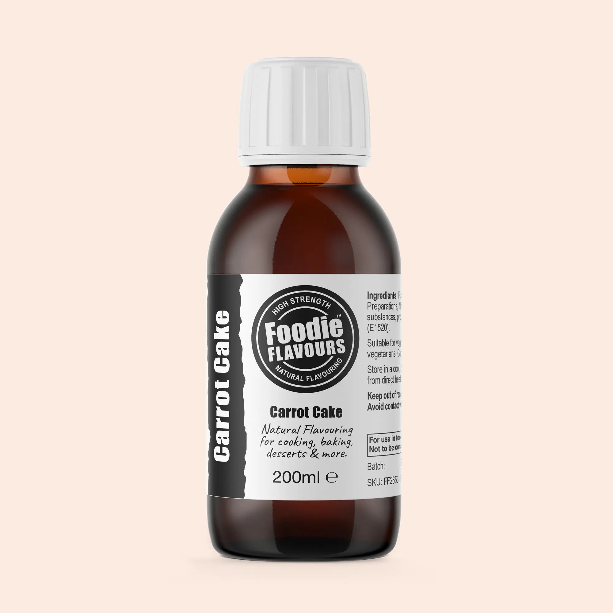 Bottle of Foodie Flavours Carrot Cake flavouring on a beige background