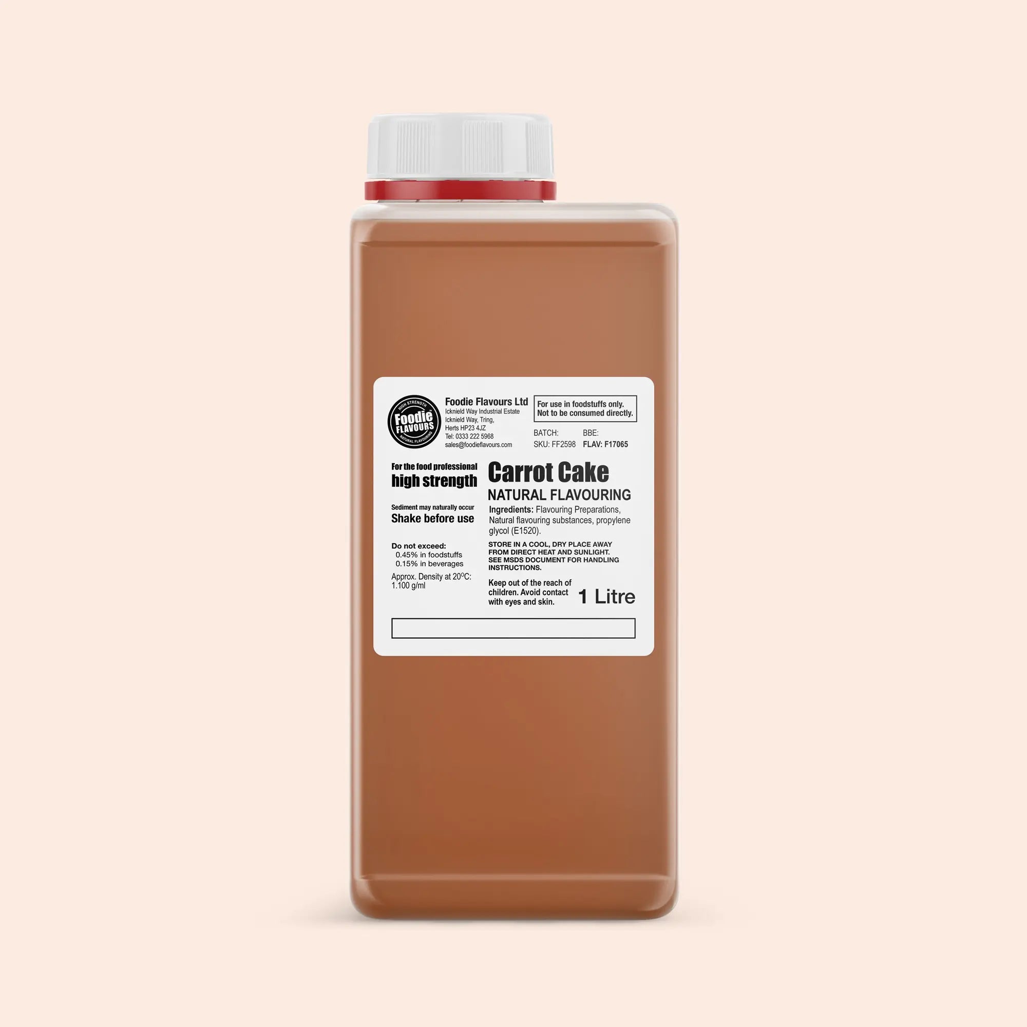 1L Bottle of Foodie Flavours Carrot Cake flavouring on a beige background