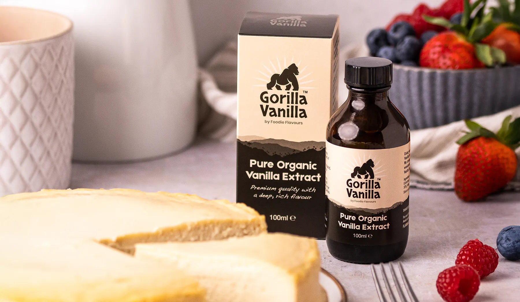 Glass bottle of gorilla vanilla, organic vanilla extract being used in a vanilla cheesecake recipe.