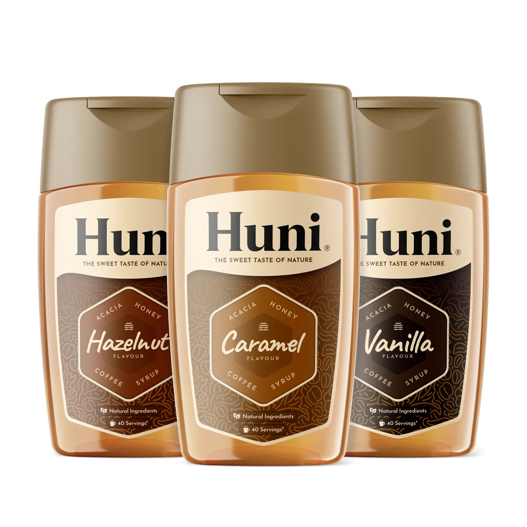 Three bottles of Huni Natural coffee syrup. Caramel, Vanilla and Hazelnut flavours.