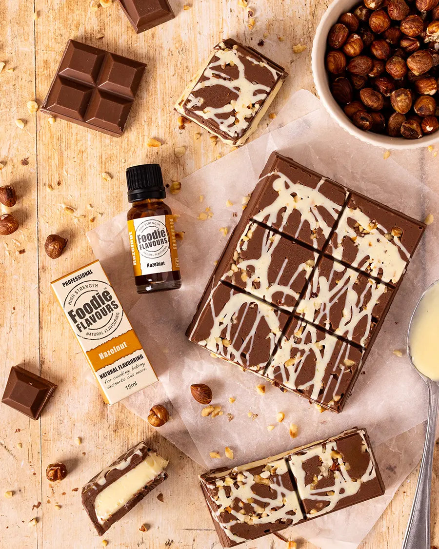 Bottle of Foodie Flavours hazelnut flavouring with hazelnut flavoured ganache filled chocolate bar