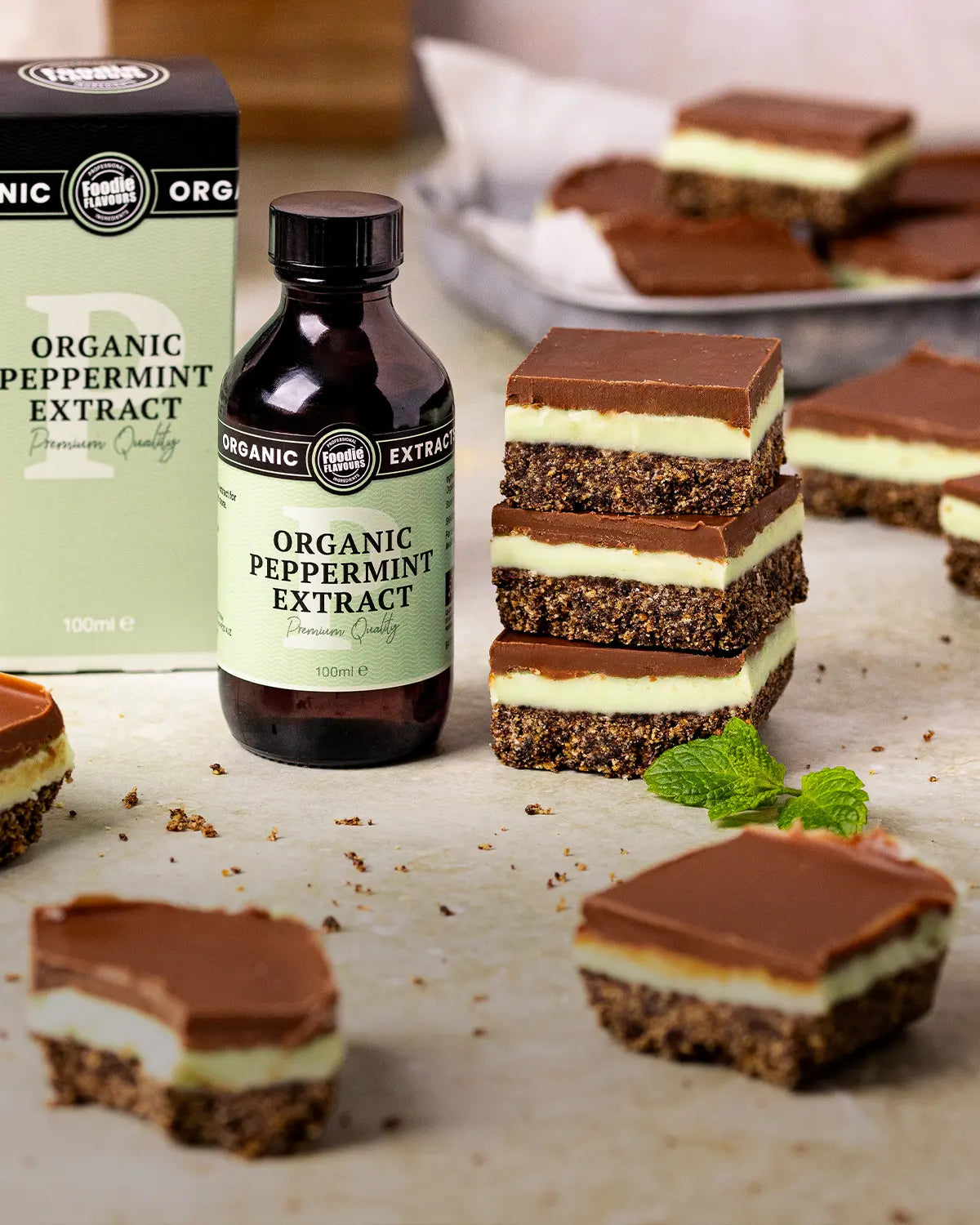 Stack of peppermint slices, bottle of organic peppermint extract