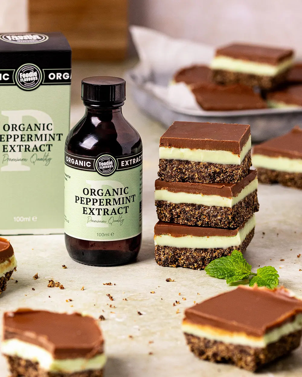 Stack of peppermint slices, bottle of organic peppermint extract